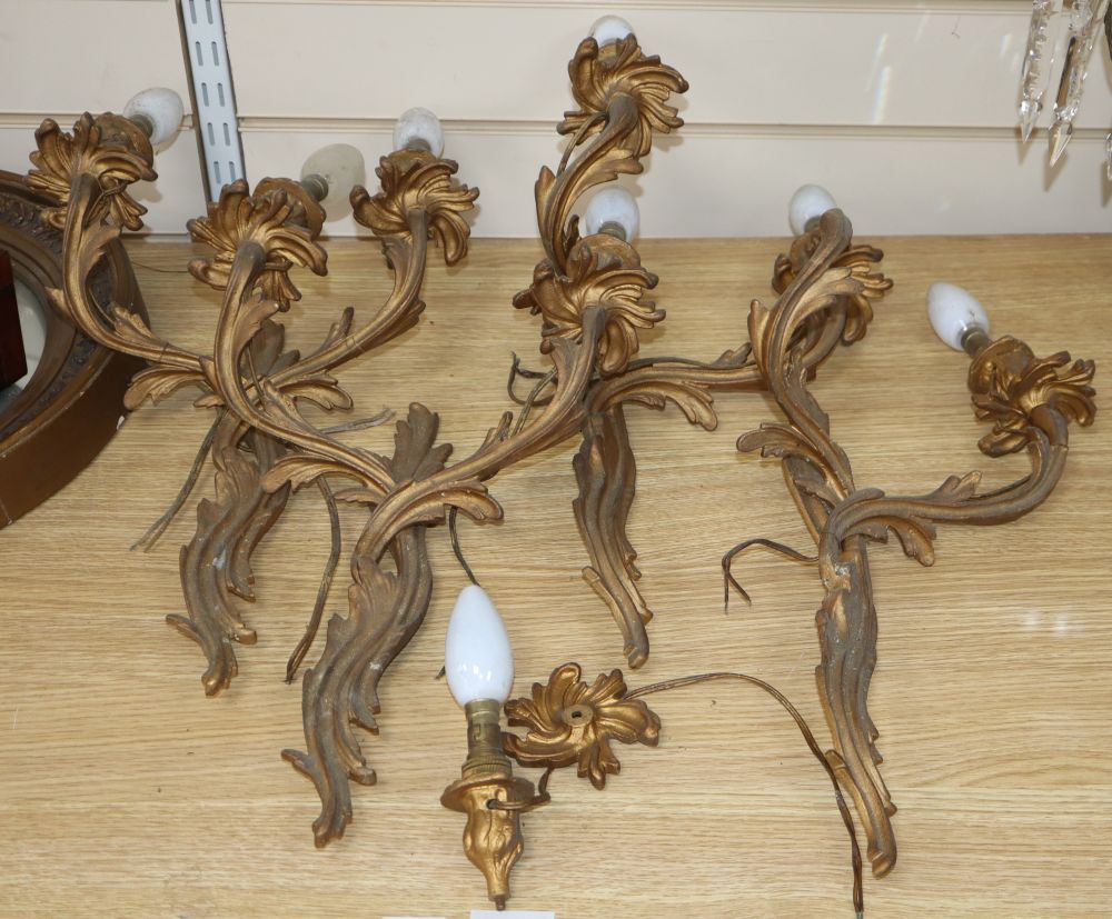 A set of three two branch wall lights and another, backplate height 35cm